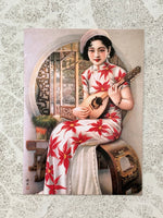 Load image into Gallery viewer, Postcard Art, Asian Woman Playing Mandolin in Red and White Silk Dress w/ Floral Pattern
