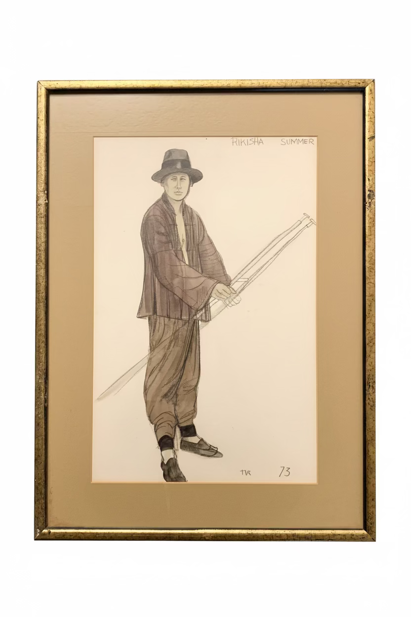 Framed artwork of a person on a beige background