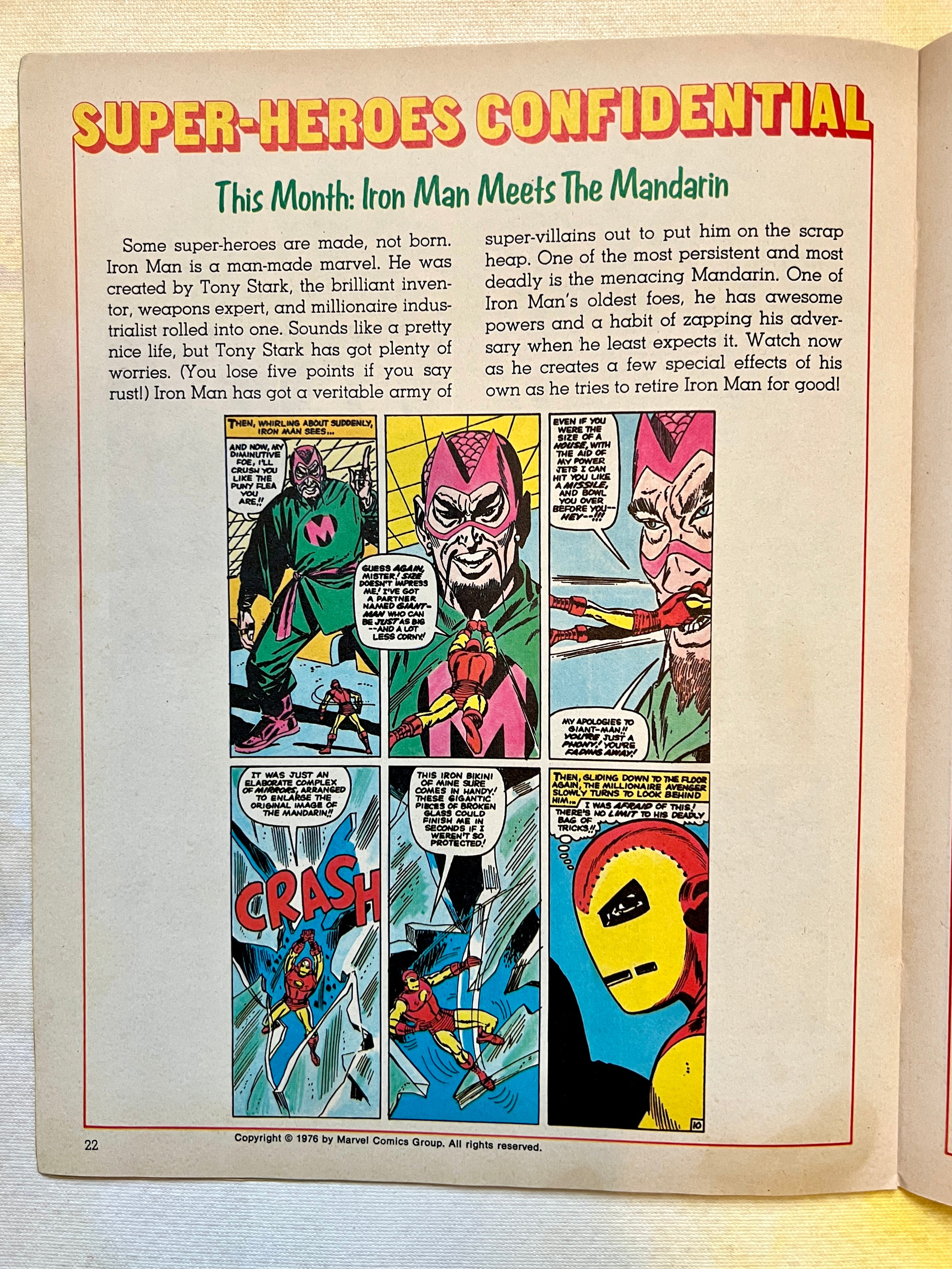 Comic book page with superhero content on a wooden surface