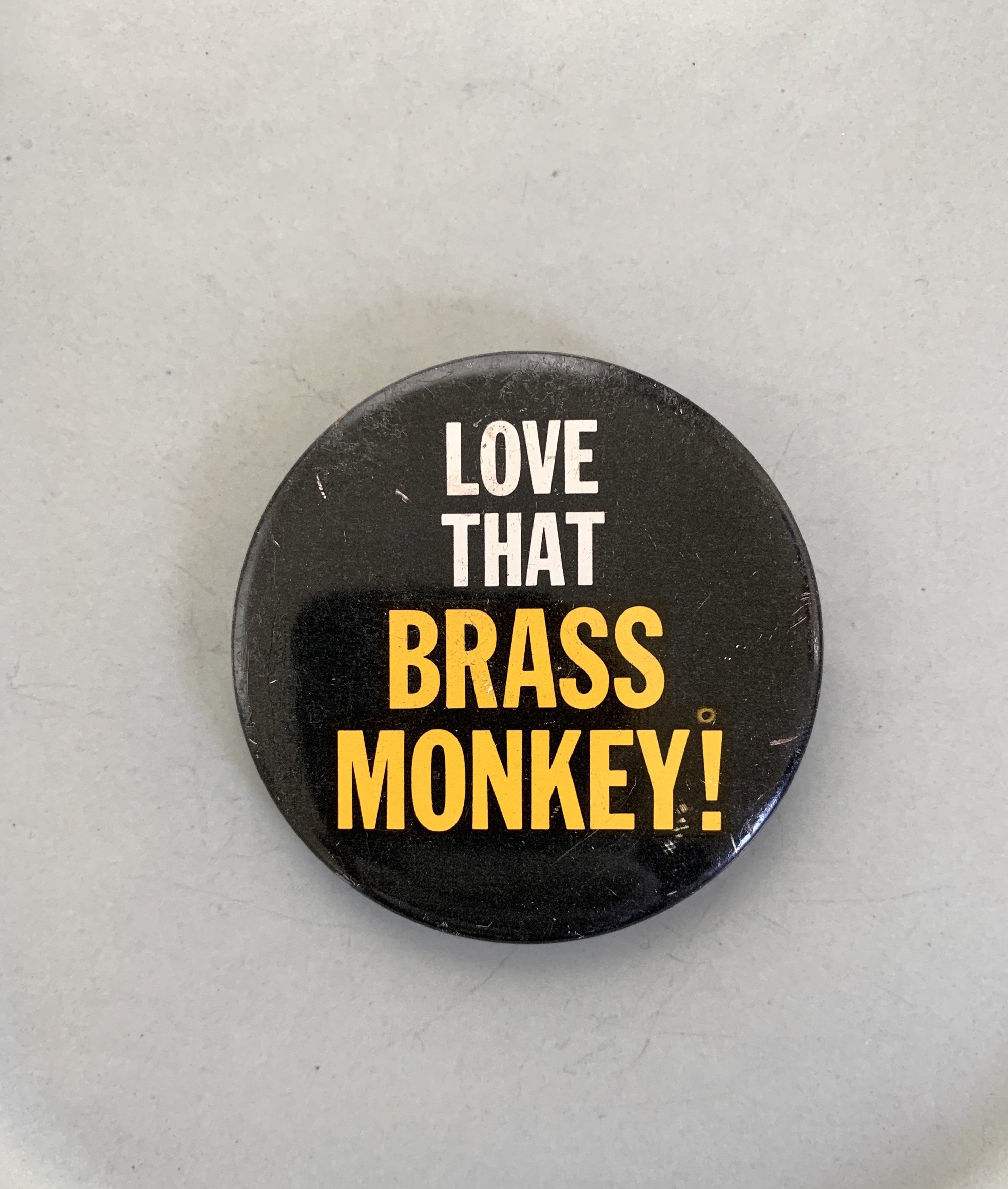 Vintage "Love That Brass Monkey" Pinback Button