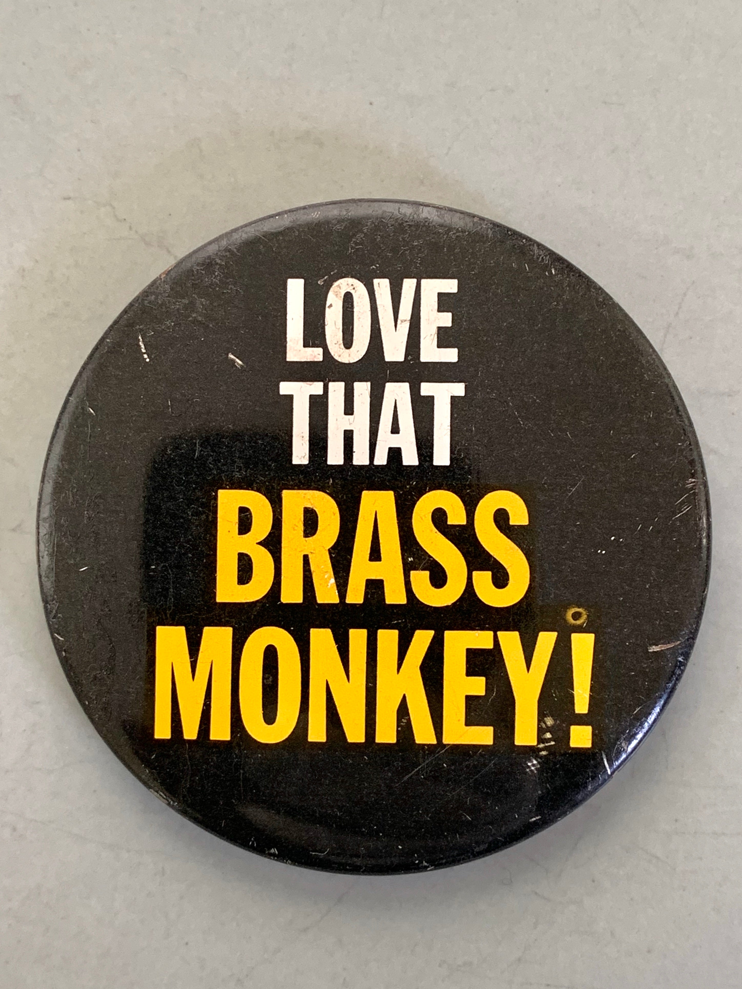 Vintage "Love That Brass Monkey" Pinback Button