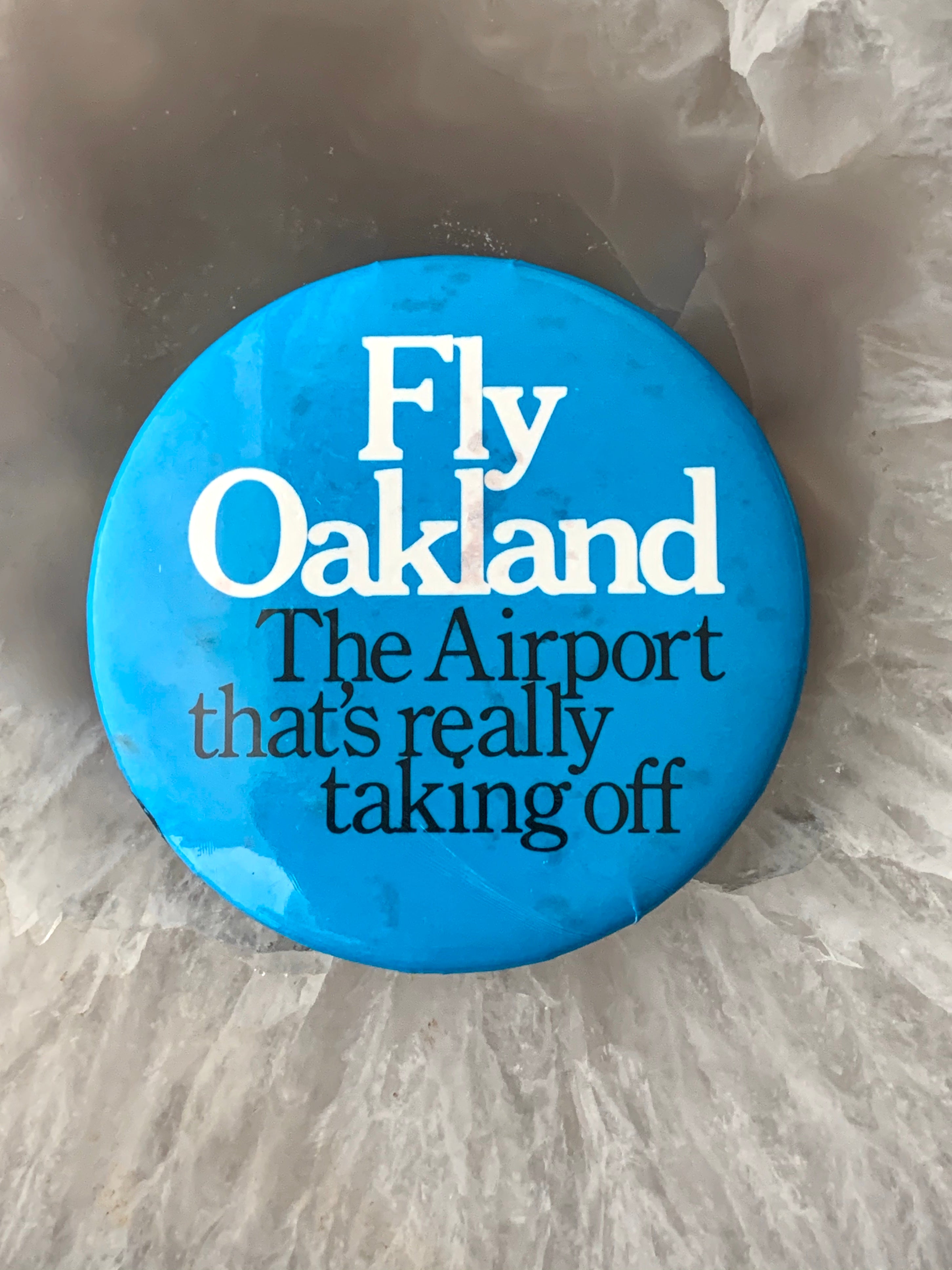 Vintage Pinback Button "Fly Oakland The Airport That's Really Taking Off"