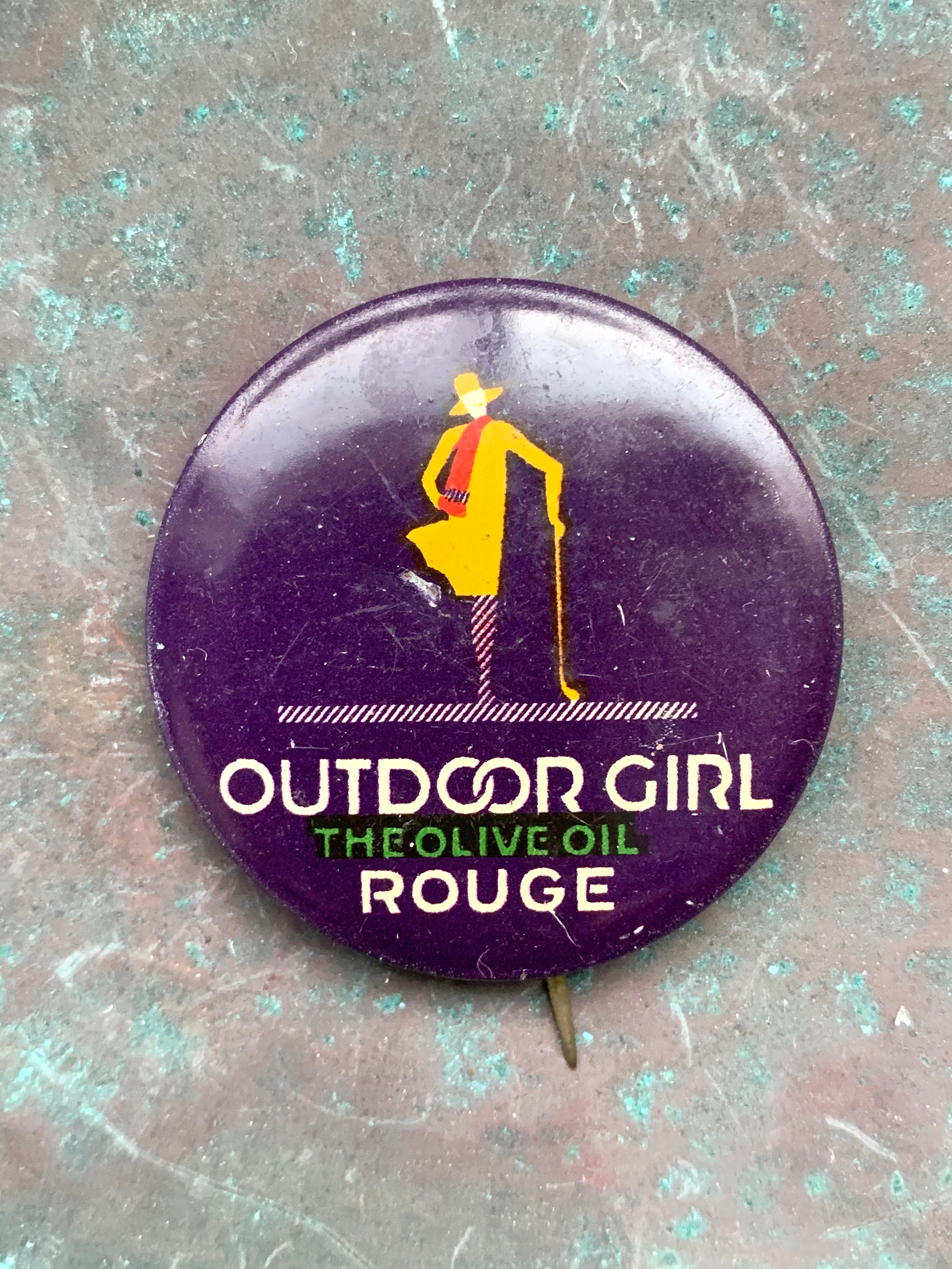 Vintage "Outdoor Girl, The Olive Oil Rouge " Pinback Button
