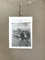 Load image into Gallery viewer, Black and White Photograph of Man w/ Vintage Classic Car; Fina Station Sign
