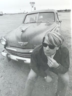 Black and White Photograph of Man w/ Vintage Classic Car; Fina Station Sign