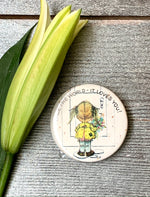 Load image into Gallery viewer, Face The World - It Loves You! Vintage Norcross Inc. Pinback Button Girl w/ Flowers
